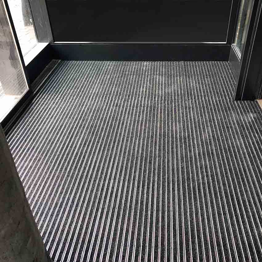 Tapis à structure aluminium sur mesure