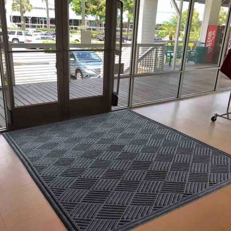 Tapis d'entrée personnalisé avec bordure en caoutchouc