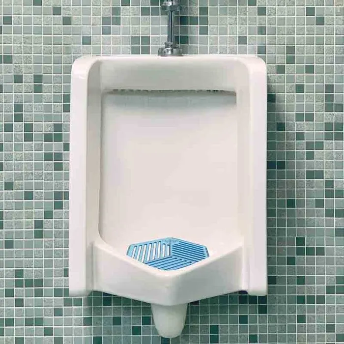 Grille urinoir parfumée anti-éclaboussures Urinal-Net