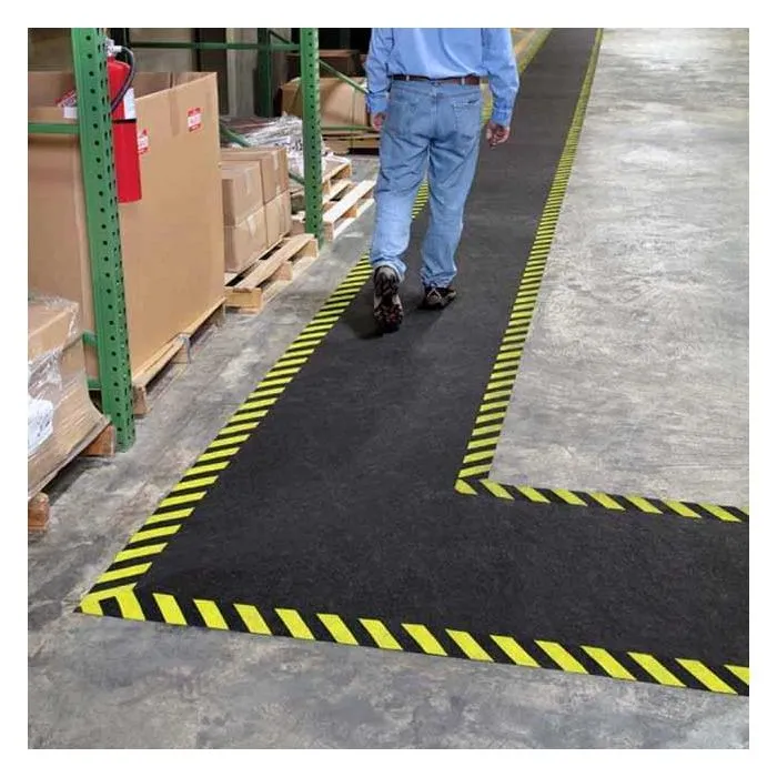 Tapis adhésif avec bandes de signalisation Pig Grippy